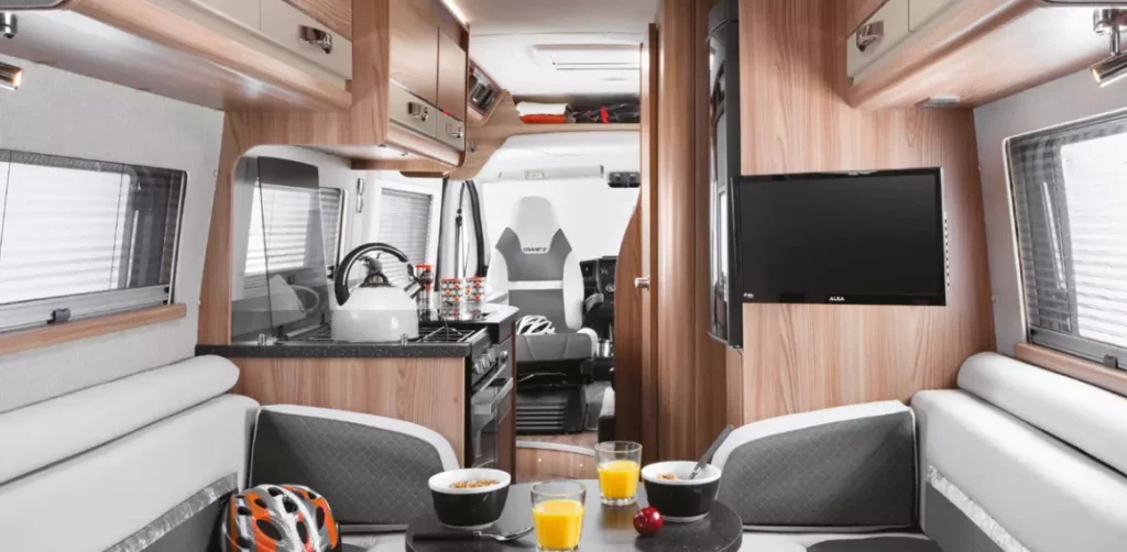 Swivelling cab seats and a generously sized table create a comfortable dining space